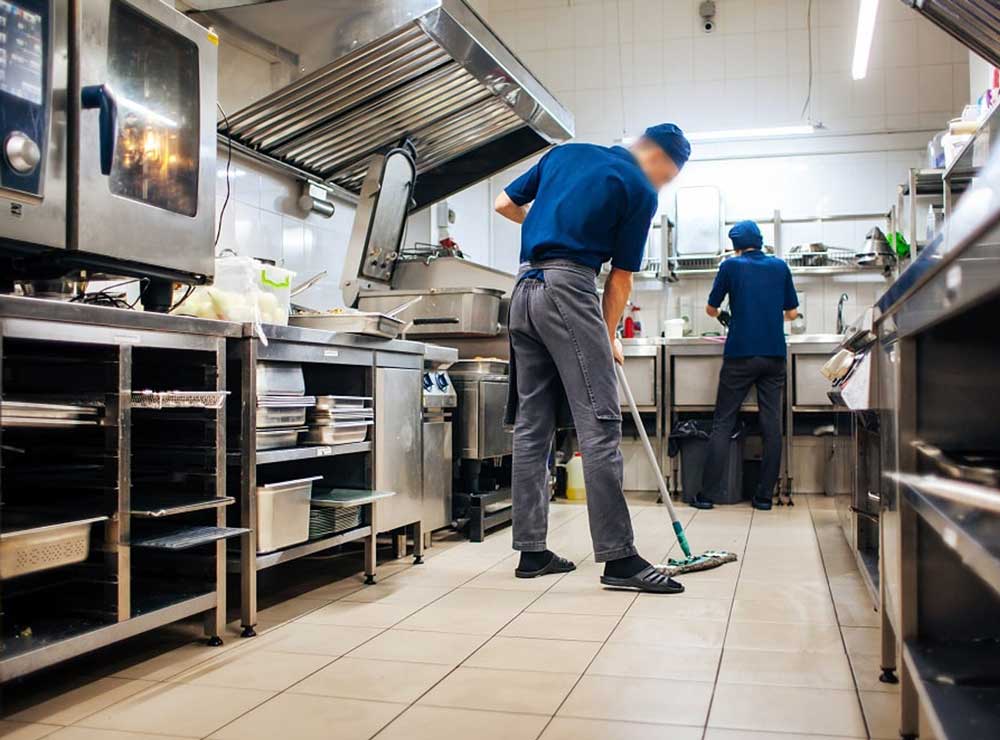 Deep kitchen cleaning of equipment and floors
